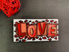 Textured Love blocks with red leopard print