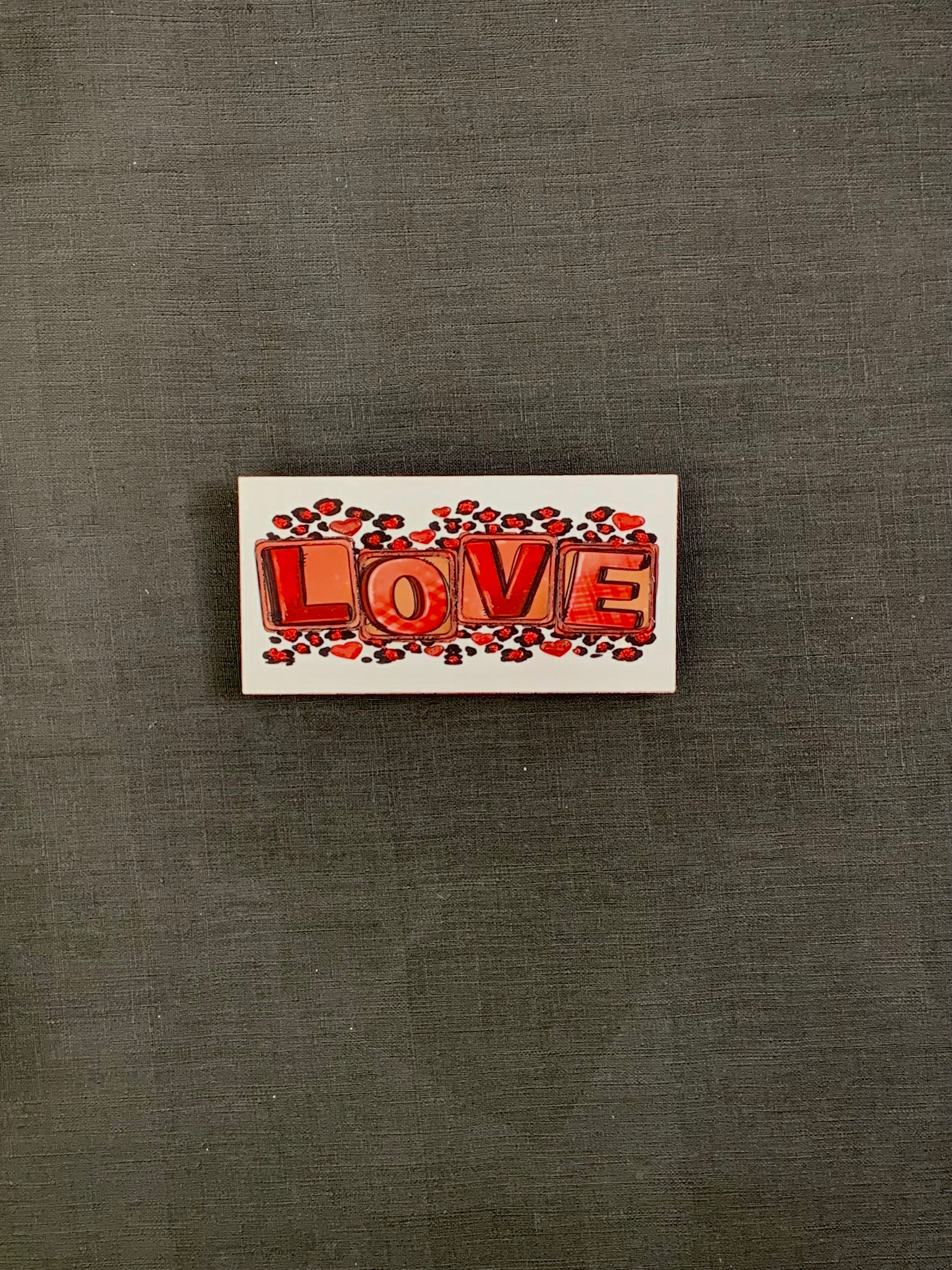 Love blocks with red leopard print